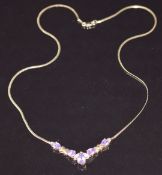 A 9ct gold necklace set with amethyst and diamonds, 4g, 38cm long