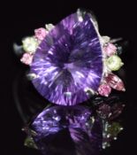 A 9ct white gold ring set with an mixed pear cut amethyst, peridot and tourmaline, 4.9g, size N