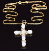 A 14k gold cross set with synthetic opals and cubic zirconia (4.5cm, 6.5g) on 9ct gold chain, 44cm
