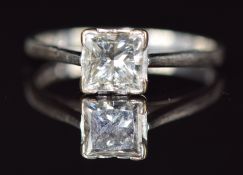 An 18ct white gold ring set with a princess cut diamond of approximately 1ct, with insurance