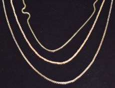 Two 14k gold chains/ necklaces (6.9g) and a 9ct gold chain/ necklace, 4g