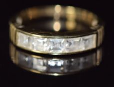 A 9ct gold ring set with cubic zirconia, 3.1g, size N