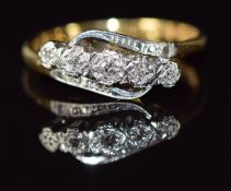 An 18ct gold ring set with diamonds in a platinum setting, 3.7g, size O