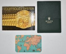 Rolex green leather card wallet with 1998 1999 calendar card and Rolex Oyster booklet.