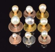 Nine yellow metal/ 9ct gold studs, each set with a pearl, 9.5g