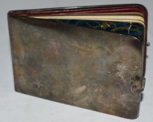 Edward VII hallmarked silver mounted notebook, with leather pouches for stamps and small notes to
