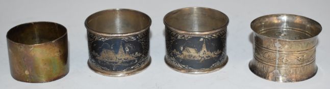 Two hallmarked silver napkin rings including a Birmingham Guild of Handicraft Ltd Victorian Arts &