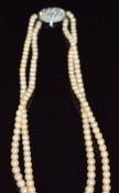 A double strand of cultured pearls, 40cm long