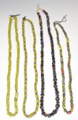 Four Venetian glass beaded necklaces, mainly millefiori