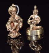 A 9ct gold charm in the form of a snake charmer and a 9ct gold charm in the form of a water carrier,