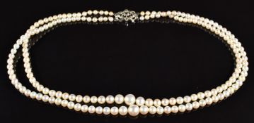 A double strand of cultured pearls with marcasite clasp, 25.2g, 38cm