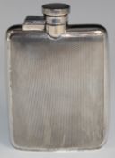Art Deco hallmarked silver hip flask with engine turned decoration and captive bayonet cap,