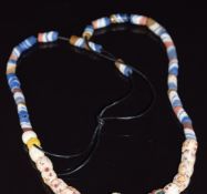 Egyptian glass beaded necklace with green stone god emblem/ pendant