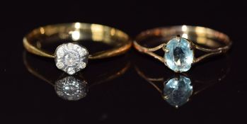 An 18ct gold ring set with diamonds in a platinum setting (1.5g, size M) and a 9ct gold ring set