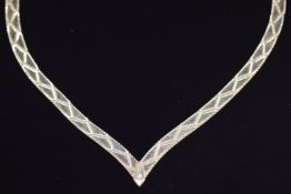 A 9ct gold ribbon necklace, 11g, 39cm long