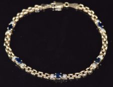 A 9ct gold bracelet set with sapphires and diamonds, 4.6g, 18cm long