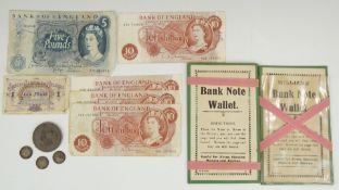 George IV 1821 crown and three silver threepence coins, together with a J B page blue £5 banknote,