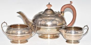 George V hallmarked silver three piece teaset of plain circular form, Birmingham 1931, maker's