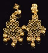 A pair of 22ct gold earrings with shell, star and sphere decoration, 6g, 4.5g