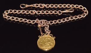 A 9ct rose gold Albert / watch chain with a 1902 gold double sovereign fob, 67.1g
