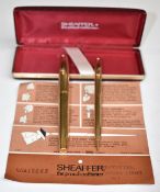 Sheaffer White Dot gold plated pen and pencil set, the fountain pen with 14k 585 gold nib, in