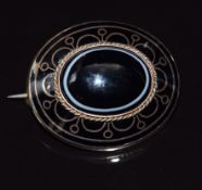 Victorian mourning brooch set with a banded agate cabochon, enamel and verso plaited hair, 10.7g,