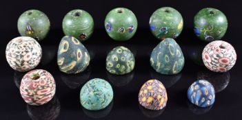 A collection of 19thC glass beads/ domes including millefiori, eye beads, etc