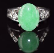Chinese white gold ring marked 22 set with a jadeite cabochon and diamonds, 3.3g, size H