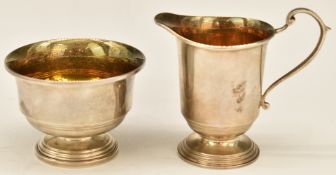 Elizabeth II feature hallmarked sugar bowl and milk jug, Birmingham 1973, maker A T Cannon Ltd,