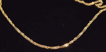 An 18ct gold necklace, 9g, 56cm long