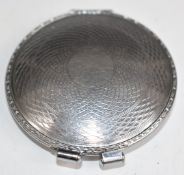 Parker (Dunhill) novelty lighter inside a compact, with engine turned decoration, diameter 6cm