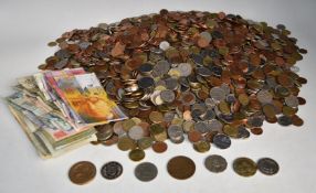 A large quantity of world coinage, includes redeemable Euros, some banknotes, souvenir tokens etc