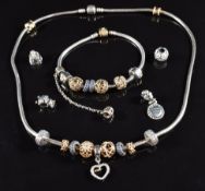 Pandora silver necklace with six 14ct gold beads/ spacers and five silver beads together with a