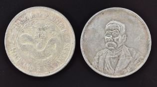 Two China Republic silver dollars, by repute obtained by vendor's grandfather during WW2