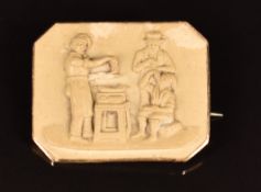 Victorian yellow metal brooch set with a lava cameo depicting a cooking scene, 4.1 x 3.3cm