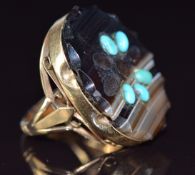 A 9ct gold ring set with banded agate and turquoise cabochons, 11.6g, size O