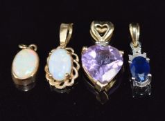 A 9ct white gold pendant set with an oval sapphire and diamonds, 9ct gold pendant set with a heart