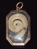 Late Victorian locket set with hair, engraved 25th January 1884, 6.2g, 3.6 x 2.2cm