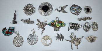 A collection of silver brooches including swallows, marcasite, elephant, Art Nouveau style, etc