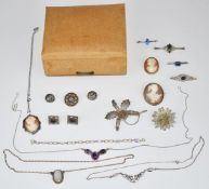 A silver pendant set with a cameo by WBs, two cameos, micro mosaic brooch, four silver brooches,