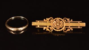 Edwardian 15ct gold brooch (3.2g) and a 9ct gold ring (0.8g)