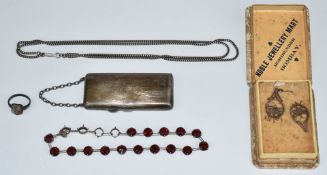 A silver cigarette case, filigree earrings, silver signet ring, necklace and white metal necklace