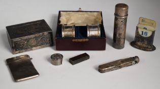Cased pair of hallmarked silver napkin rings, hallmarked silver needle or similar case, Victorian