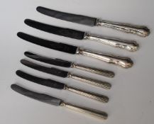 Seven hallmarked silver handled knives including four Art Deco style examples, length of longer 24.