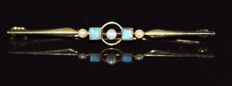 A 15ct gold brooch set with opals and three pearls, 2.8g, 5.7cm long