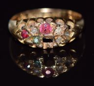 A c1915 18ct gold ring set with rubies and diamonds