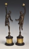 Pair of late 19th or early 20thC figural candlesticks formed as classical figures raised on zephyr