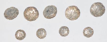 Victorian set of nine hallmarked silver buttons comprising five large (diameter 26mm) and four