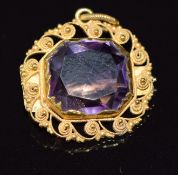 A filigree pendant set with an emerald cut amethyst, 3.2g, 1.5 x 1.7cm