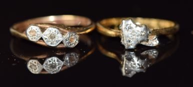 An 18ct gold ring set with diamonds in a clover shaped platinum setting (2.5g, size K) and a 9ct